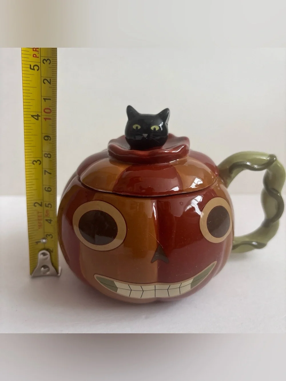 Over The Garden Wall Enoch Pumpkin Mug With Lid  And Black Cat Peeking On Top
